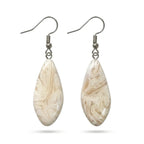"Diddit Mother of Pearl drop earrings in a teardrop silhouette, crafted with a polished cream and beige marbled finish and finished with silver fishhook wires, displayed on a clean white background."